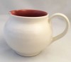 Poole Pottery, Twintone, Red Indian and Magnolia (C95) Cream Jug